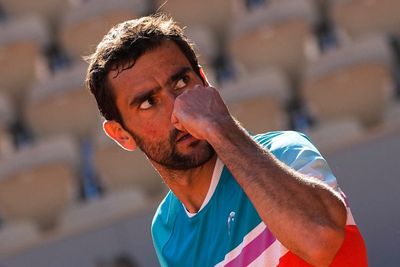Marin Cilic fights through as Iga Swiatek marches on – day 11 at the French Open