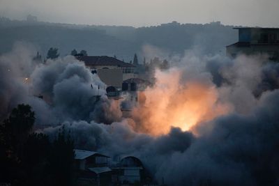 Palestinians say Israeli troops kill 1 in West Bank raids