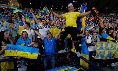 ‘Great spirit’: jubilant Ukrainians savour football win on streets of Kyiv