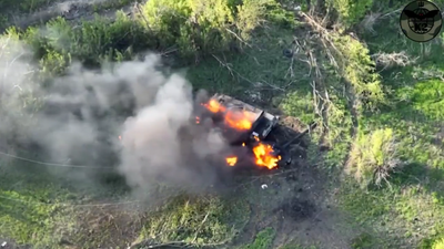 Video shows Russian soldiers walking away after their tank is hit by landmines