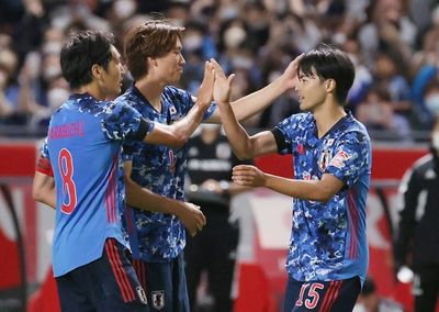 Japan vow to 'throw everything' at Brazil after thrashing Paraguay