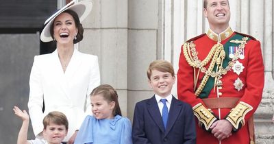 Beaming Charlotte follows Prince William's lead after waving at dad during parade