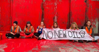 Angry Edinburgh protestors daub city centre office in red paint in gas field demo