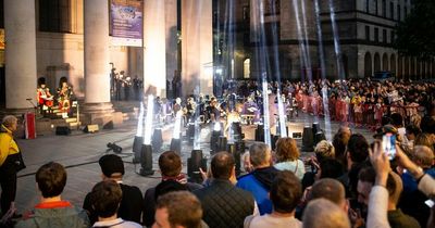 Patriotic crowds turn out to St Peter's Square as beacon beams lasers into sky to mark Queen's Jubilee