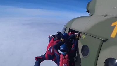 Russian Propaganda Clip Shows Skydivers Spelling ZOV In Air