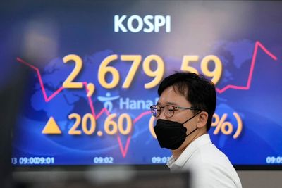Asian shares rise, China trading closed for national holiday