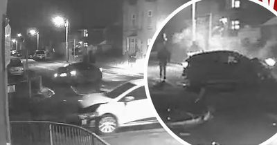 Terrifying moment speeding driver ran red light and hit car carrying mum and young son