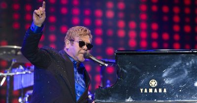 Elton John sets fans straight on health after being seen in a wheelchair