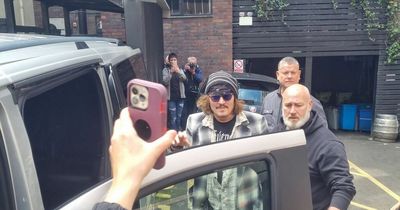 Fans swarm Johnny Depp as he leaves Glasgow hotel ahead of Royal Concert Hall gig