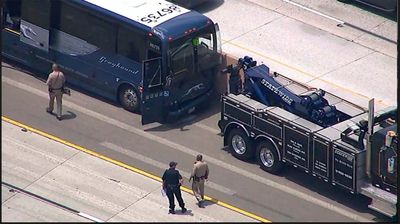 13 hurt when Greyhound bus blows tire on California highway