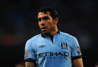 Former Manchester United and Manchester City striker Carlos Tevez retires