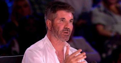 Simon Cowell jokes he should 'borrow helmet' from Scooter Boys after bike crash