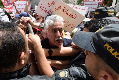 Skirmishes as police block Tunisia protests against July referendum