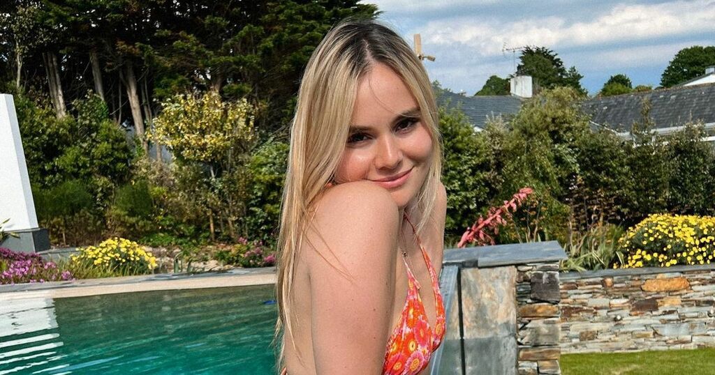 Holly Ramsay slips into bikini for poolside snap as…