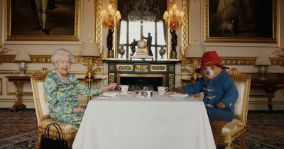 Queen and Paddington tap along to We Will Rock You as the Platinum Jubilee gig kicks off