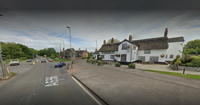 Driver rushed to hospital following crash outside pub