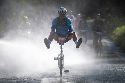 Slovenians race to celebrate legendary fold-up bike