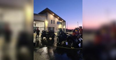 Person rescued from mud in night-time beach rescue