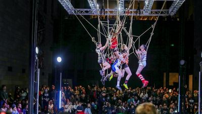 Football players suspended in midair for NGV art installation recreating 2011 AFL mark of the year