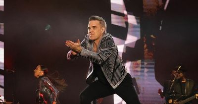 Robbie Williams sings Oasis at huge homecoming gig - and says partying with Gallaghers sparked Take That split