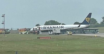 Ryanair plane 'stuck' on runway as flights cancelled and emergency services at the scene