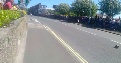 Isle of Man TT riders narrowly avoid ball hazard on road during Superbike race