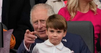 Sweet moment Prince Charles puts Louis on his knee after he becomes restless