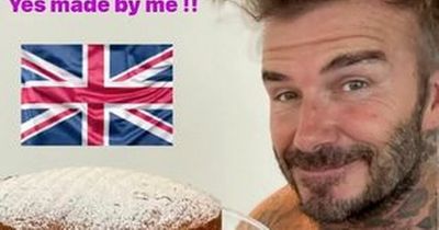 Shirtless David Beckham's cheeky question for Victoria as he shows off homemade cake