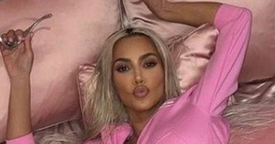 Kim Kardashian is pretty in pink as she shares snaps taken by daughter North