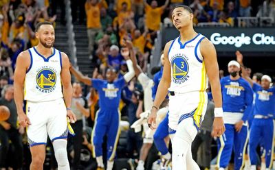 Steph Curry and Jordan Poole looking at each other after Poole’s buzzer-beater became a meme