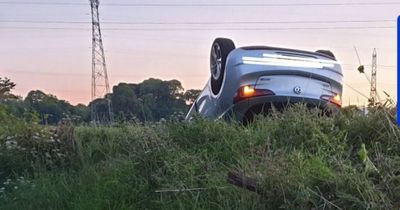 Drunk driver flips car onto roof in horror crash as police make arrest