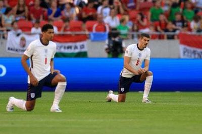 Uefa under fire to change rules over behind-closed-doors games after England stars booed taking knee