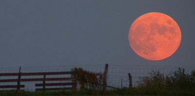 Why does the Moon look close some nights and far away on other nights?