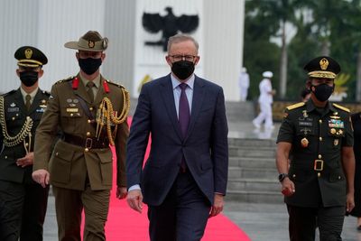 Australian PM goes on bamboo bicycle ride with Indonesian president on his first visit to country