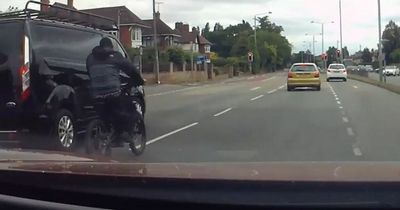 'Dangerous' e-bike rider without helmet drives through red light on A52 in dashcam footage