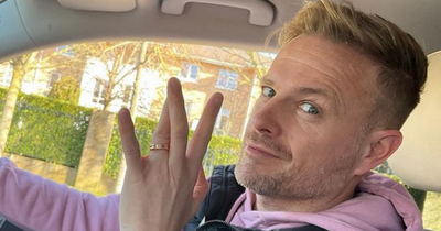 Westlife's Nicky Byrne sparks friendly rivalry with Boyzone's Ronan Keating as he spots local shop putting bands head to head