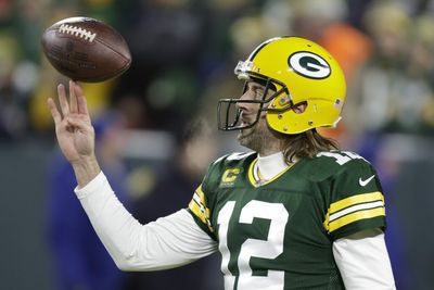 Aaron Rodgers reports to Green Bay Packers’ mandatory minicamp