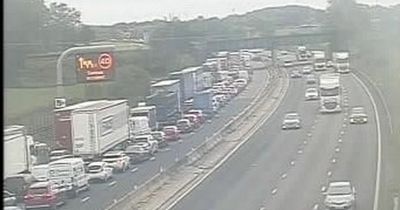 M6 crash near Manchester Airport causes 12-mile tailbacks and 60-minute delays
