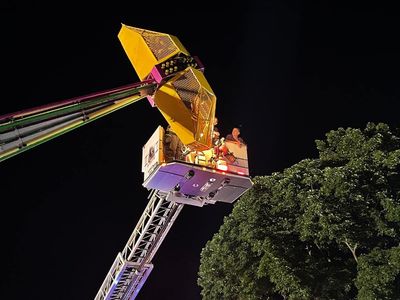 Seven people rescued from carnival ride after it stalled 40 feet in the air at Catholic funfair