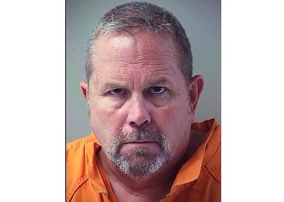 Officials: Florida fire chief is arrested on murder charge