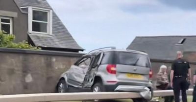 Driver rushed to hospital after car ploughs into wall near Edinburgh airport