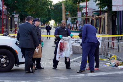 Police arrest two in connection to Philadelphia mass shooting that left three dead and 11 wounded