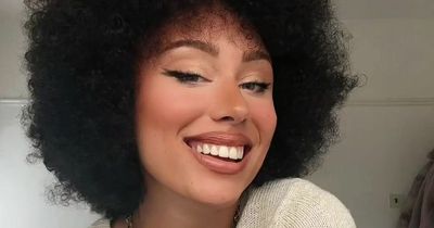 Mixed-race woman finally embraces curly locks - only to be branded 'too white' for an afro