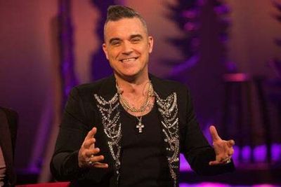 Robbie Williams jokes he could play Knebworth if he sold tickets as cheaply as Liam Gallagher