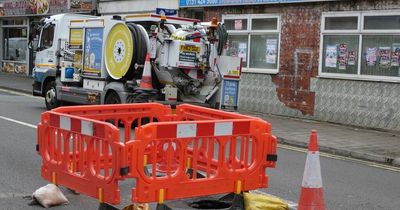 Sinkhole opens as busy road collapses and water firm launch probe