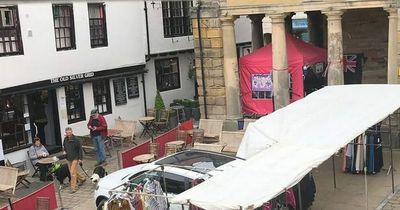 Driver leaves Audi illegally parked for days - so traders set up around it