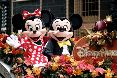 Couple face backlash for choosing Mickey and Minnie appearances at wedding over feeding guests