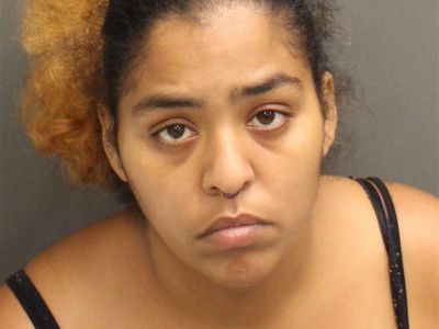 A mother is arrested after police say her 2-year-old shot her husband