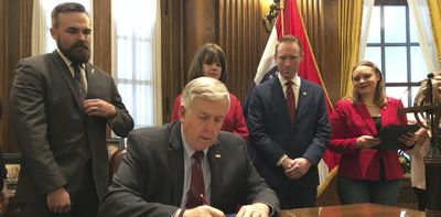 What triggers the 'trigger laws' that could ban abortions?