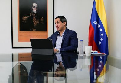 Venezuela's Guaido to have call with Biden, won't attend Americas summit